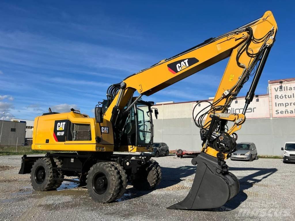 CAT M 318 F Gumikerekes kotrók