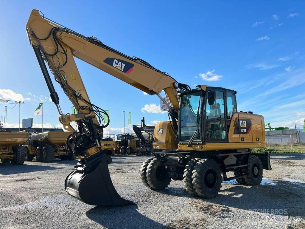 CAT M 318 F Gumikerekes kotrók