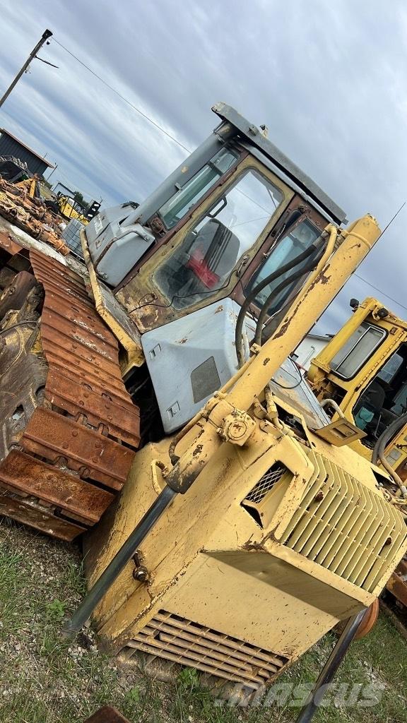 Komatsu D65 EX Lánctalpak, láncok és futóművek