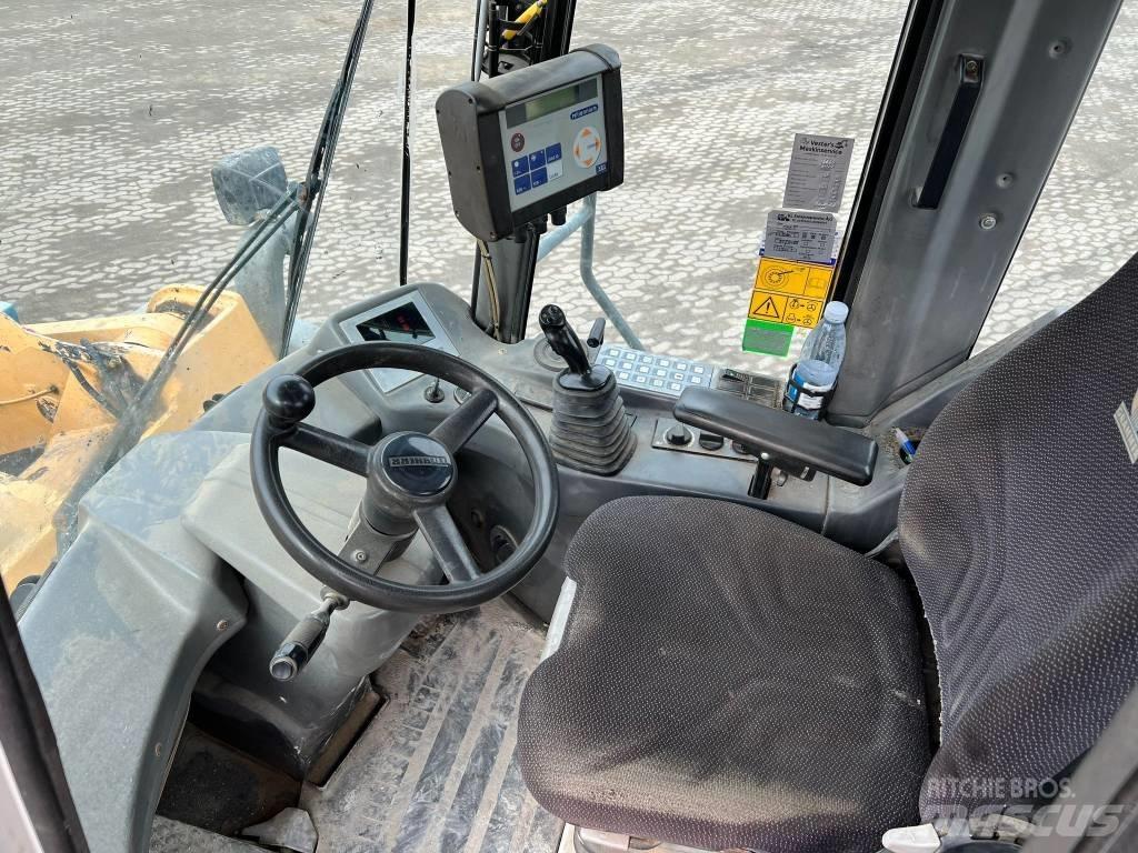 Liebherr 580 Gumikerekes homlokrakodók