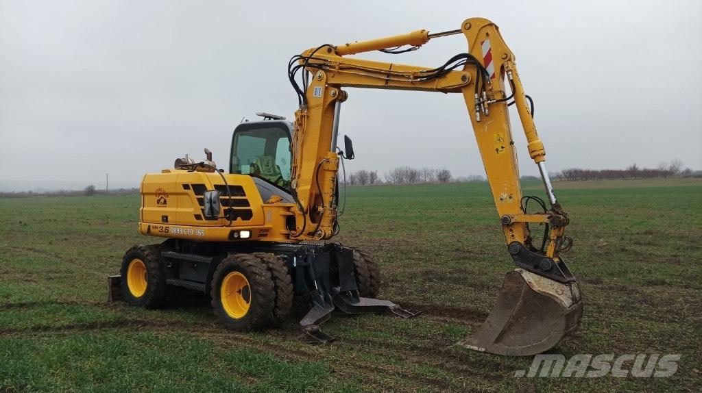 New Holland MH 3.6 Gumikerekes kotrók