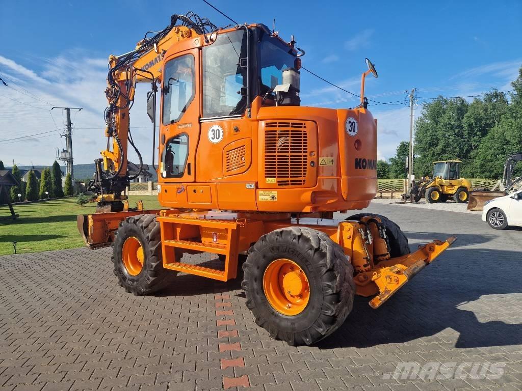 Komatsu PW110 Gumikerekes kotrók