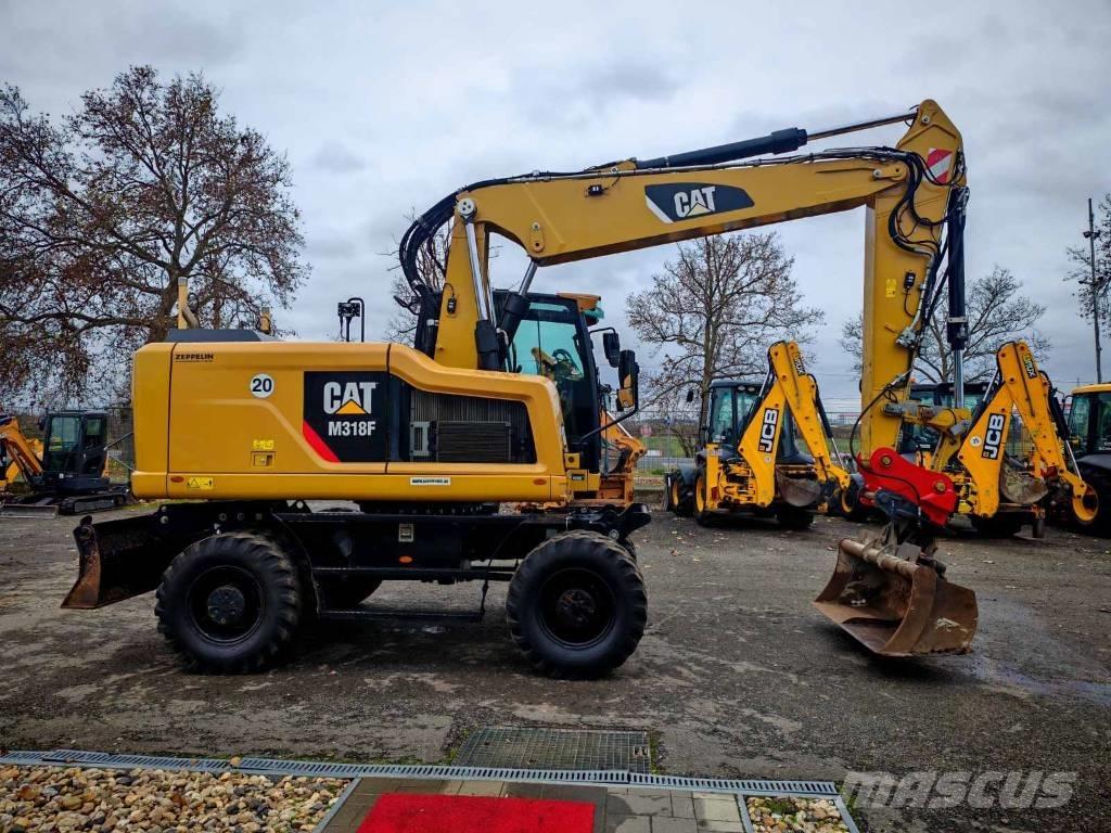 CAT M 318 F Gumikerekes kotrók
