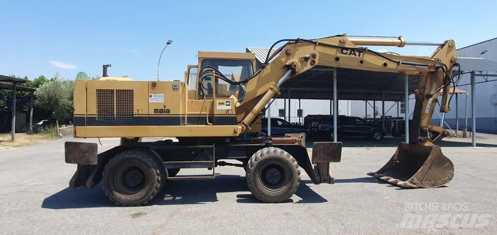 CAT 214 B Gumikerekes kotrók