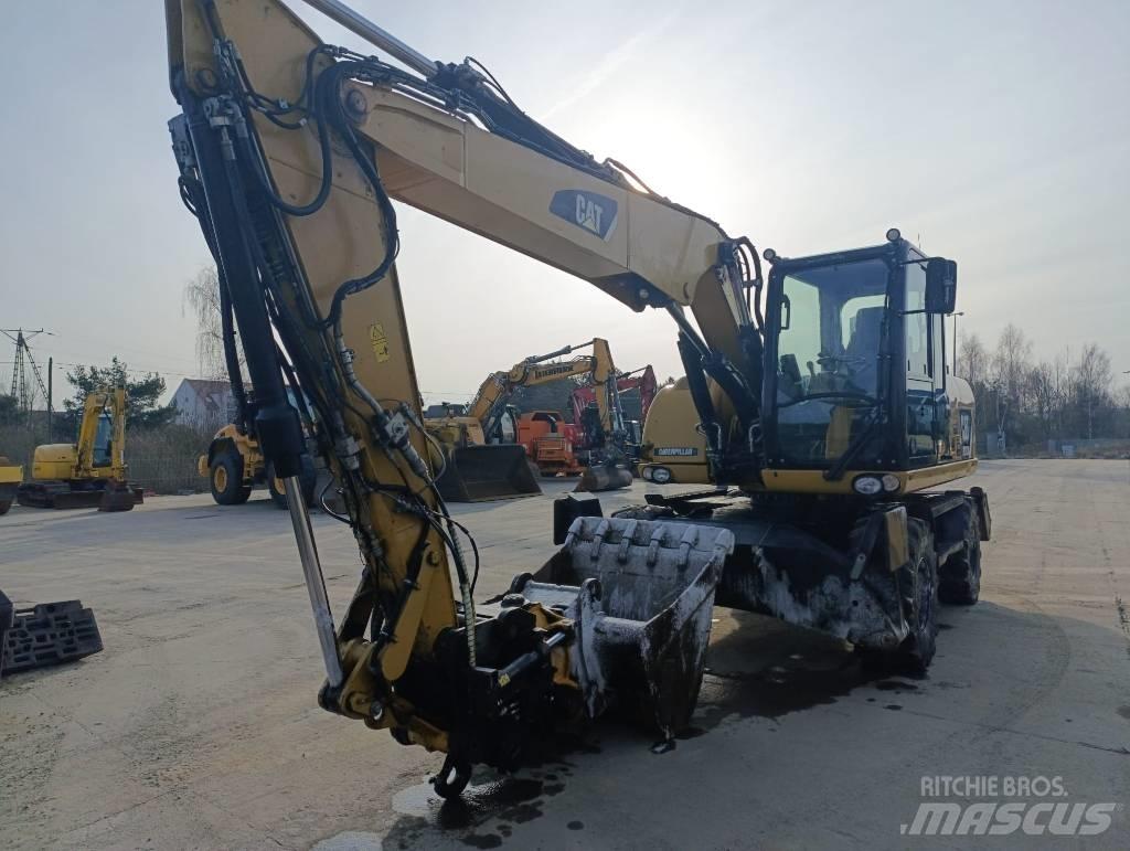 CAT M 313 D Gumikerekes kotrók