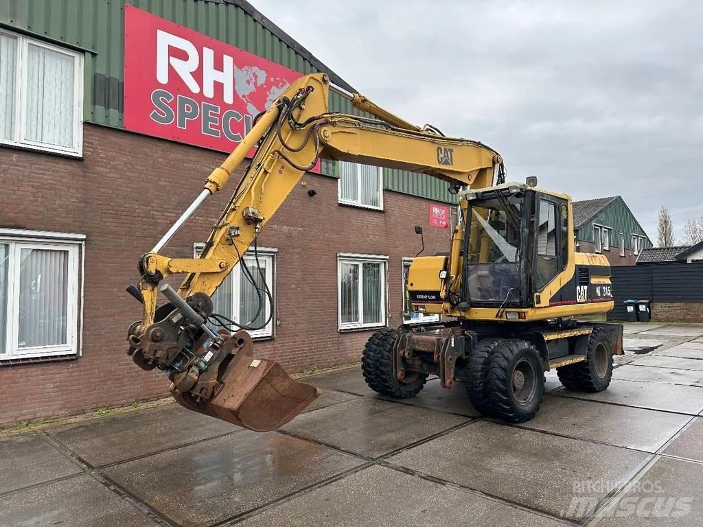 CAT M315 +ROTO CE Gumikerekes kotrók