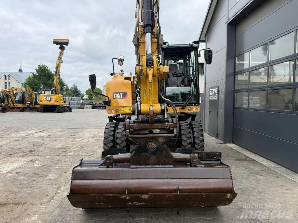 CAT M316F Gumikerekes kotrók
