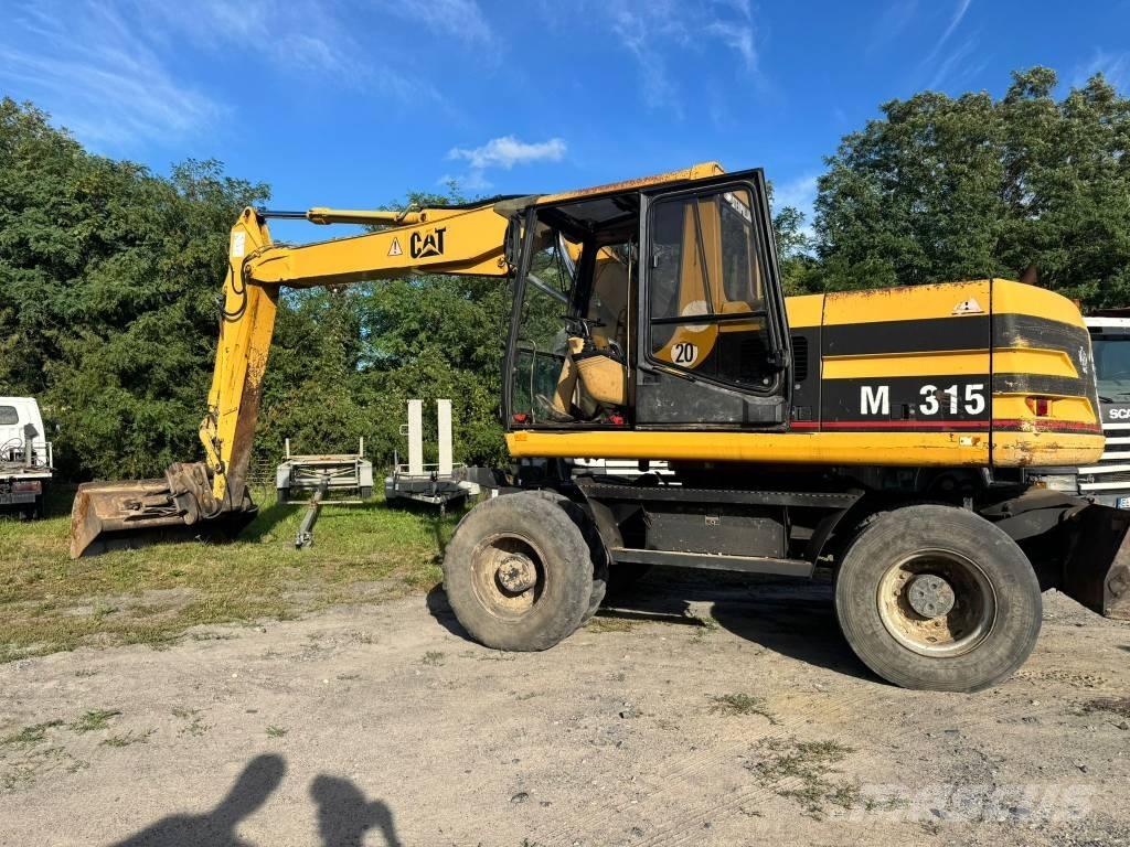 CAT M 315 Gumikerekes kotrók