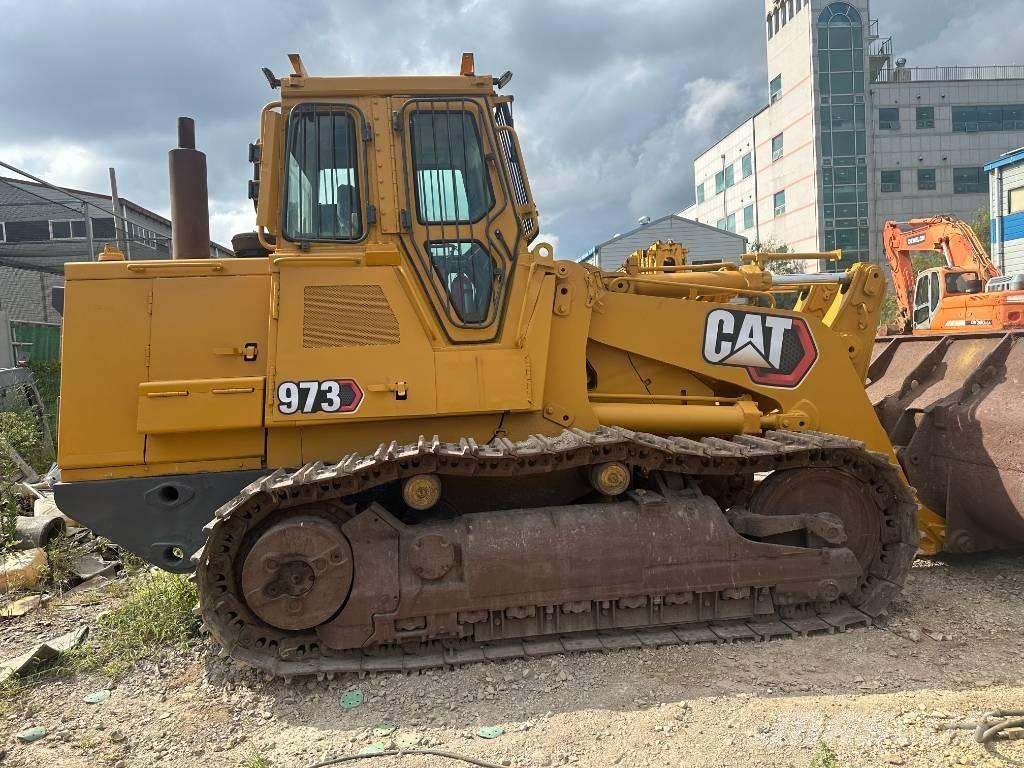 CAT 973 Lánctalpas homlokrakodók