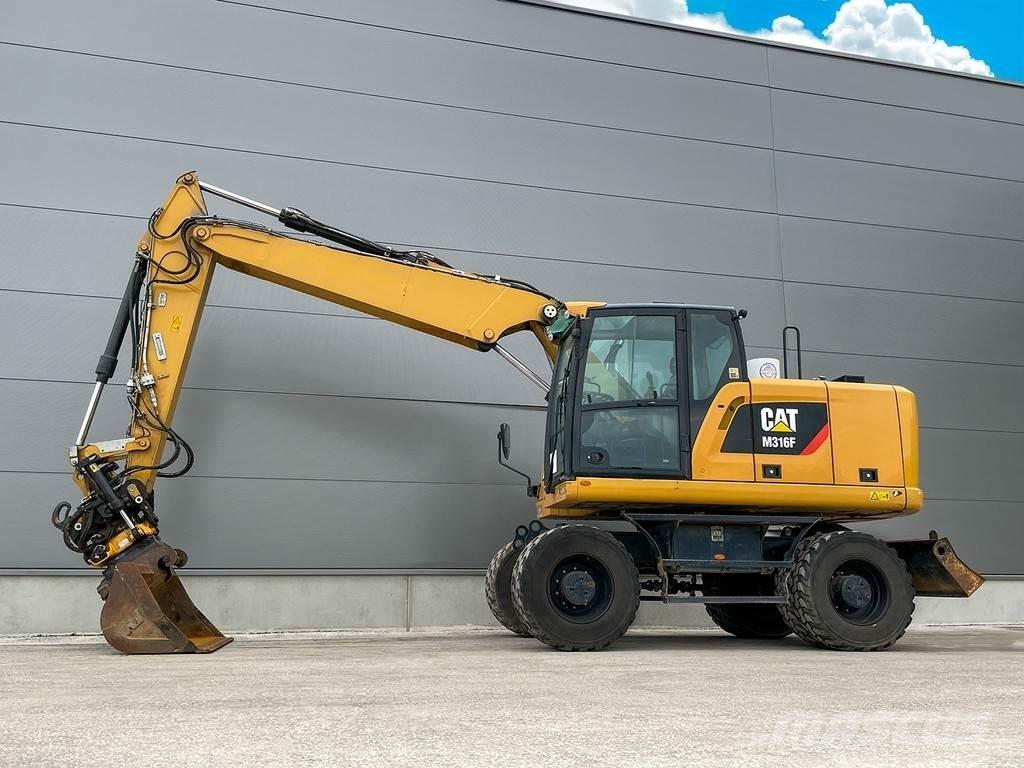 CAT M316F Gumikerekes kotrók