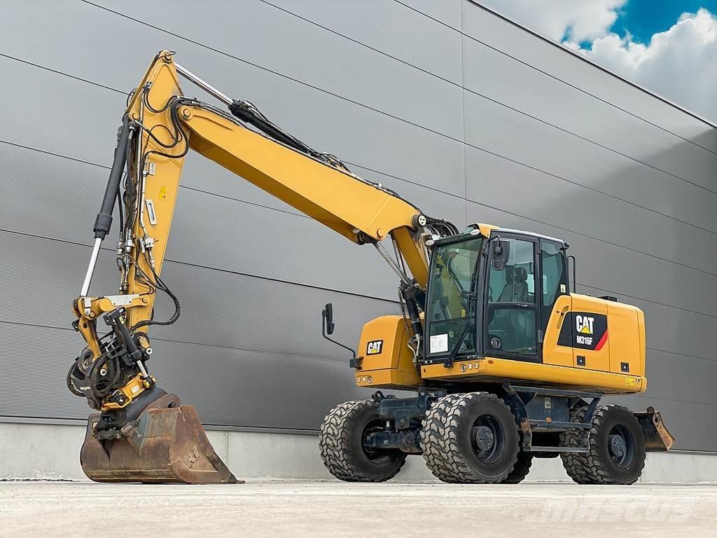 CAT M316F Gumikerekes kotrók