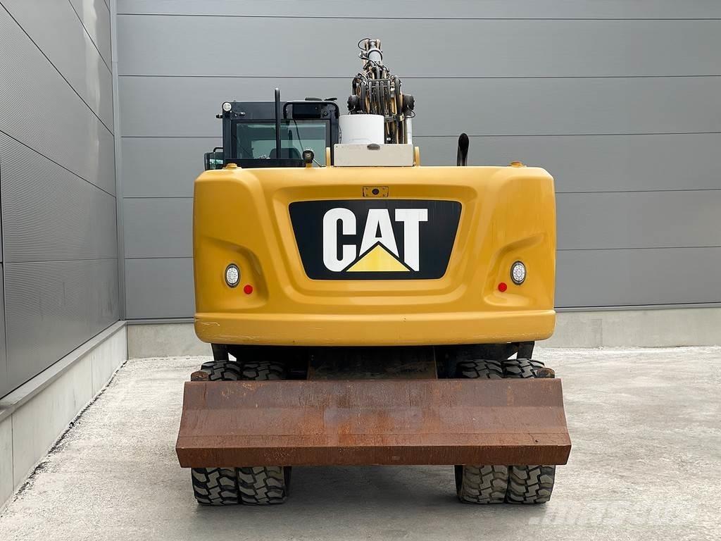 CAT M316F Gumikerekes kotrók