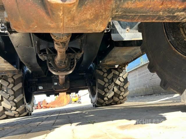 Hitachi ZX 140 W-5B Gumikerekes kotrók
