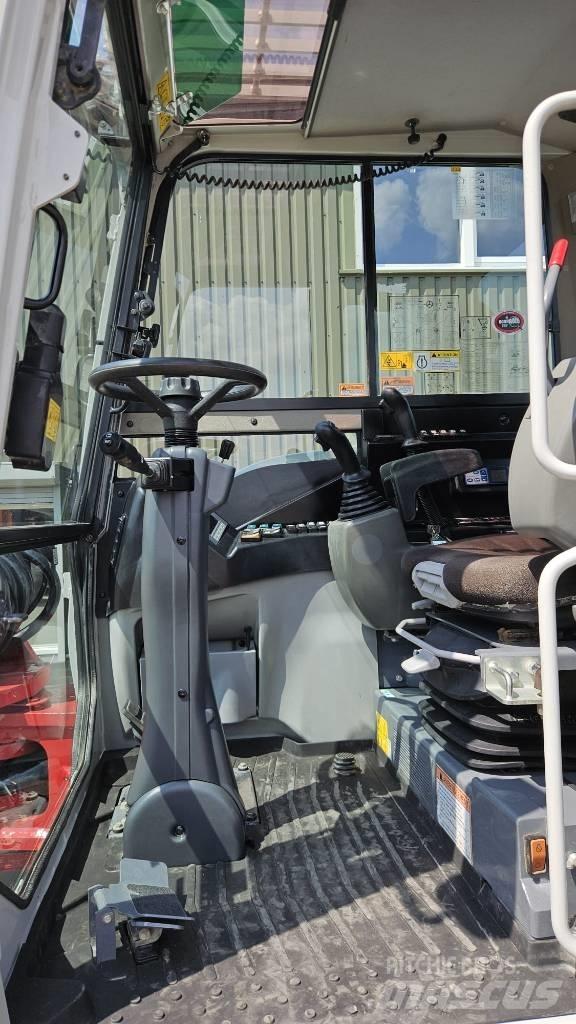 Takeuchi TB295W Gumikerekes kotrók