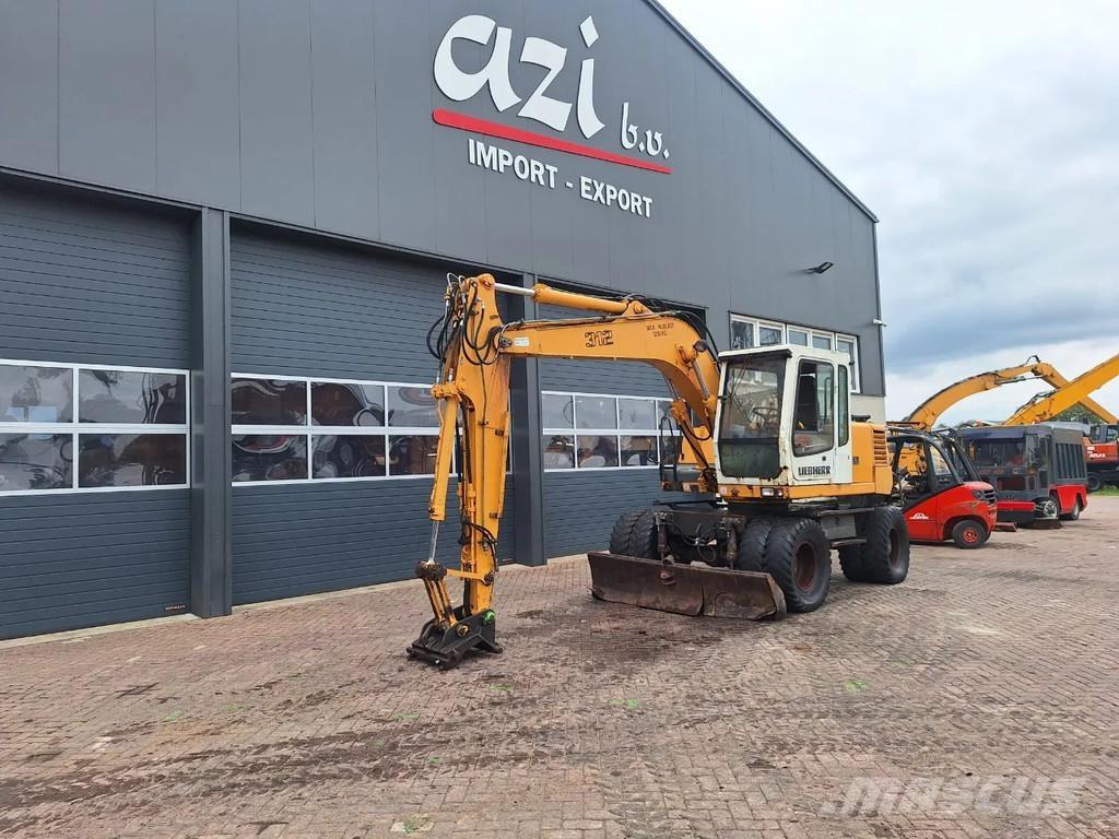 Liebherr A312 Gumikerekes kotrók