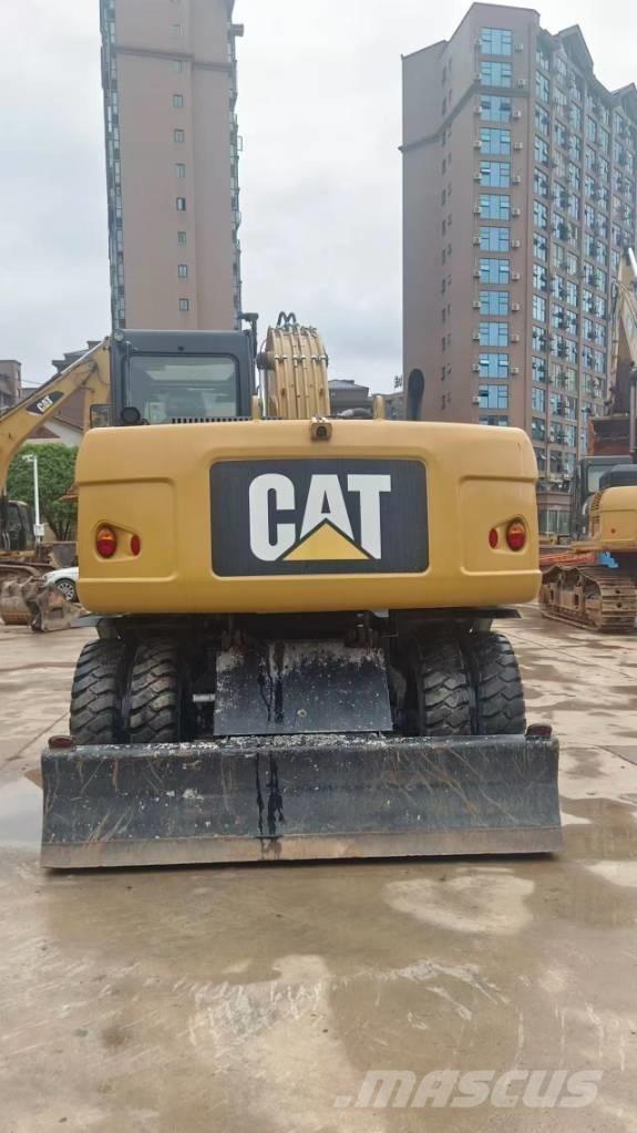 CAT M 315 D Gumikerekes kotrók