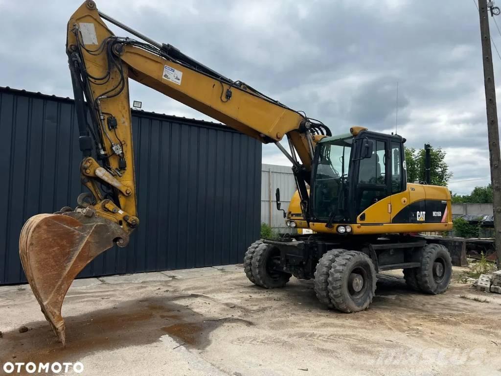 CAT M 316 D Gumikerekes kotrók