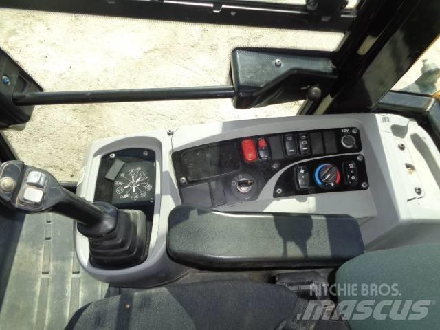 CAT 908M Gumikerekes homlokrakodók