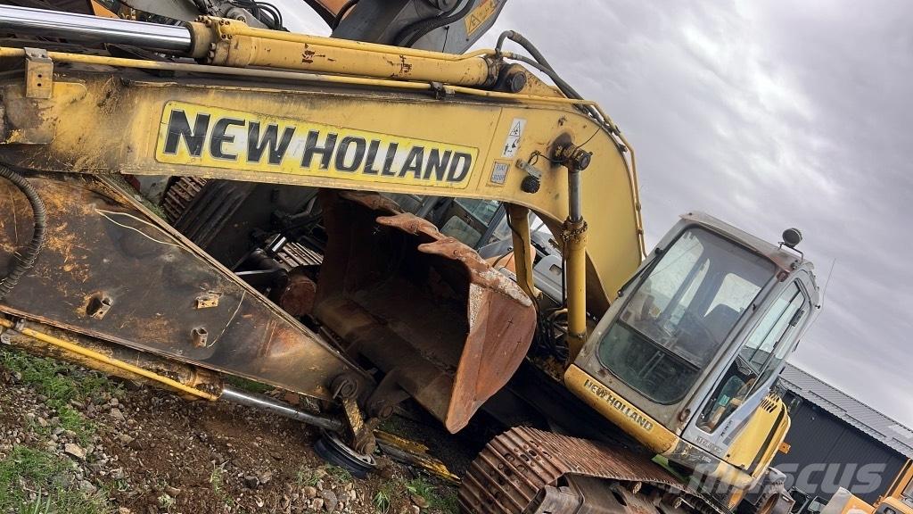 New Holland E 215 B Lánctalpak, láncok és futóművek