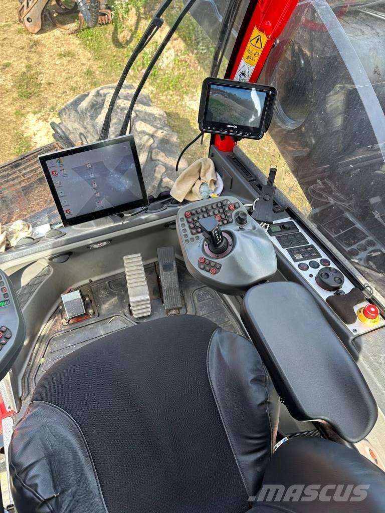Komatsu 951 Betakarítók