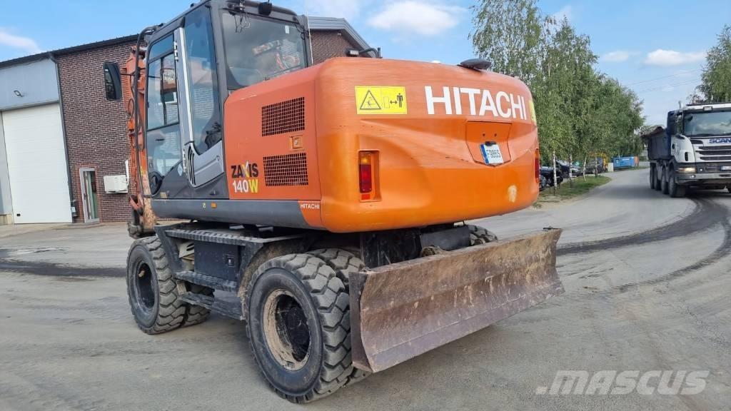 Hitachi ZX 140 W-3 Gumikerekes kotrók