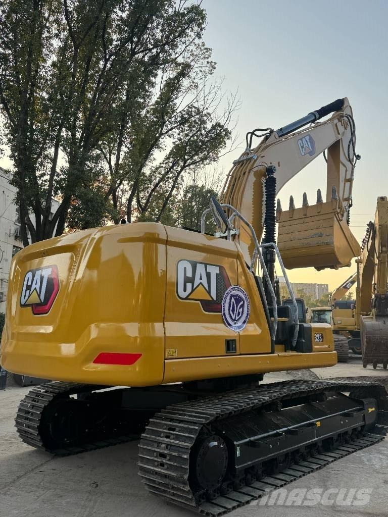 CAT CAT323 Közepes (midi) kotrók 7 t - 12 t