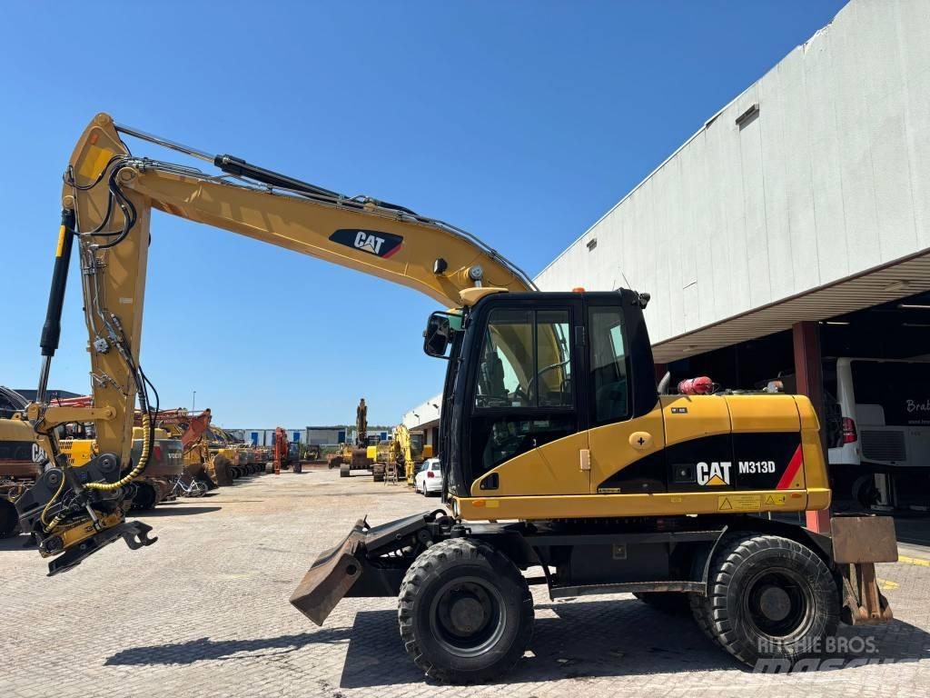 CAT M 313 D Gumikerekes kotrók