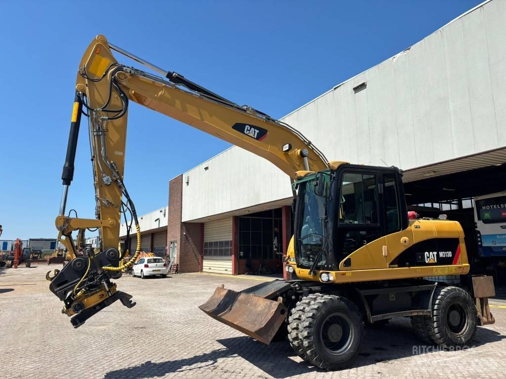 CAT M 313 D Gumikerekes kotrók