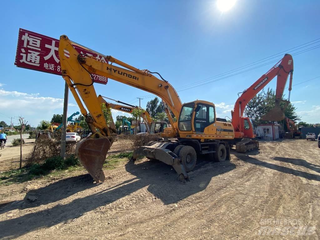 Hyundai 210w Gumikerekes kotrók