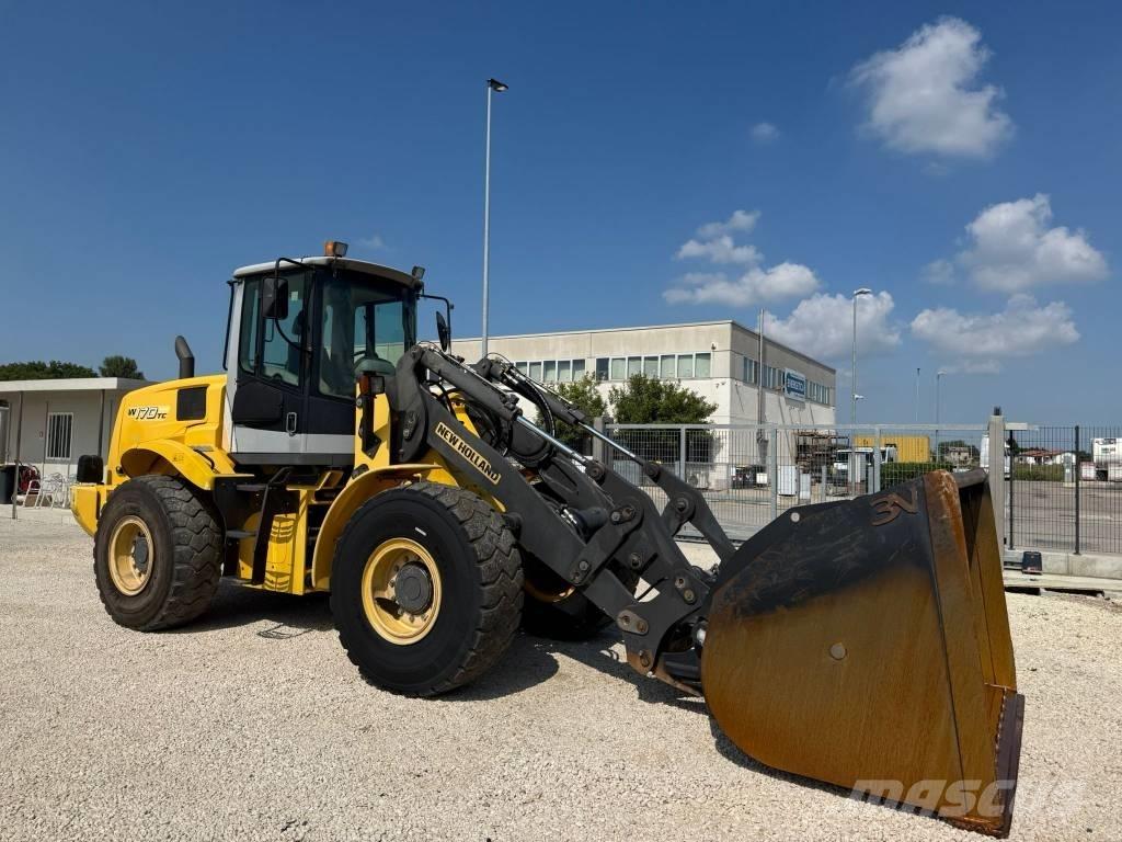 New Holland W 170 TC Gumikerekes homlokrakodók