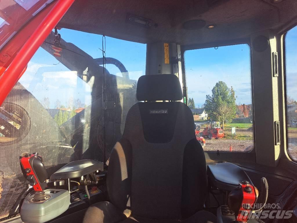 Komatsu 931 Betakarítók