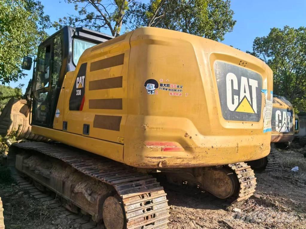 CAT 323 Lánctalpas kotrók
