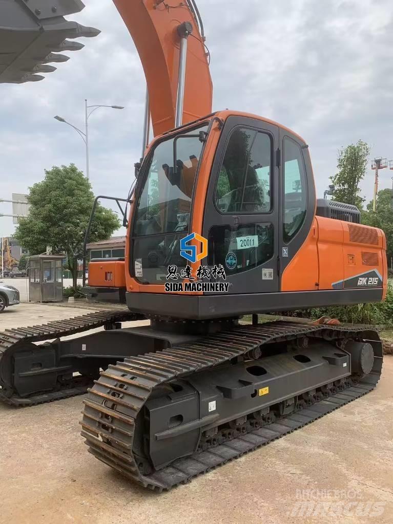 Develon DX 215 Közepes (midi) kotrók 7 t - 12 t
