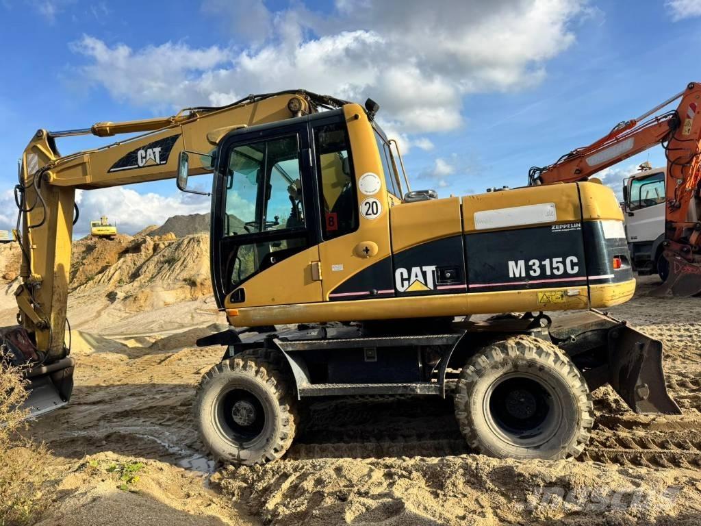 CAT M 315 C Gumikerekes kotrók