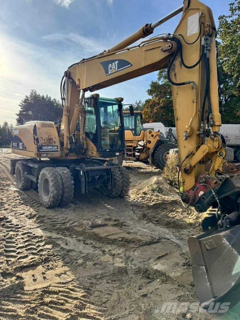 CAT M 315 C Gumikerekes kotrók