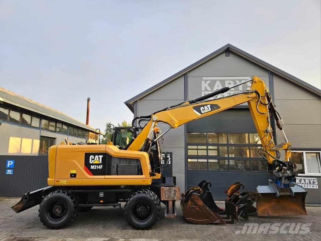 CAT M 314 Gumikerekes kotrók