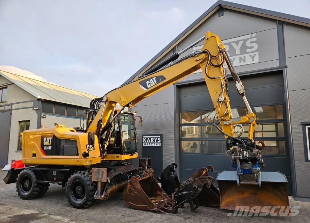 CAT M 314 Gumikerekes kotrók
