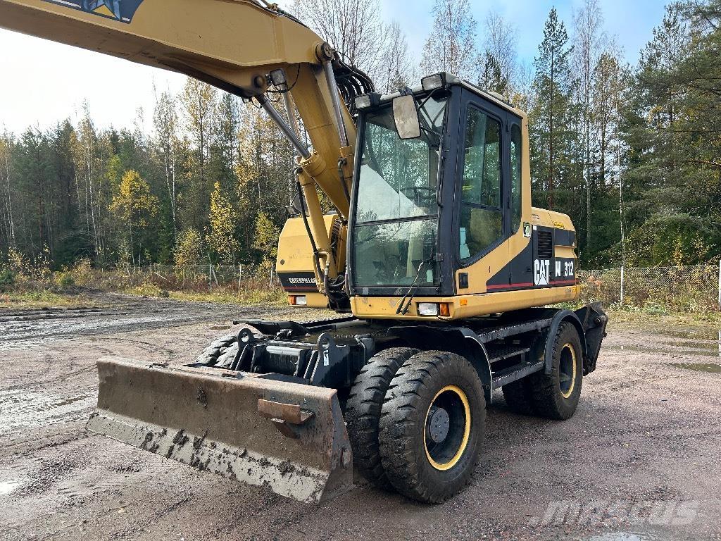 CAT M312 Gumikerekes homlokrakodók