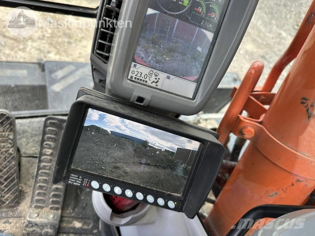 Hitachi ZX 140 W-5B Gumikerekes kotrók