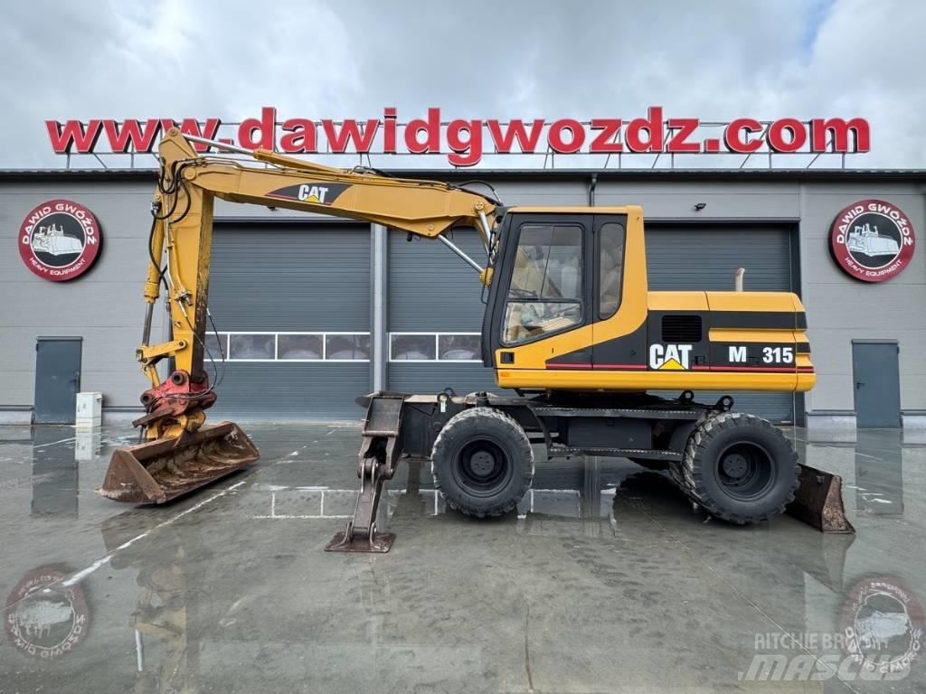 CAT M 315 Gumikerekes kotrók