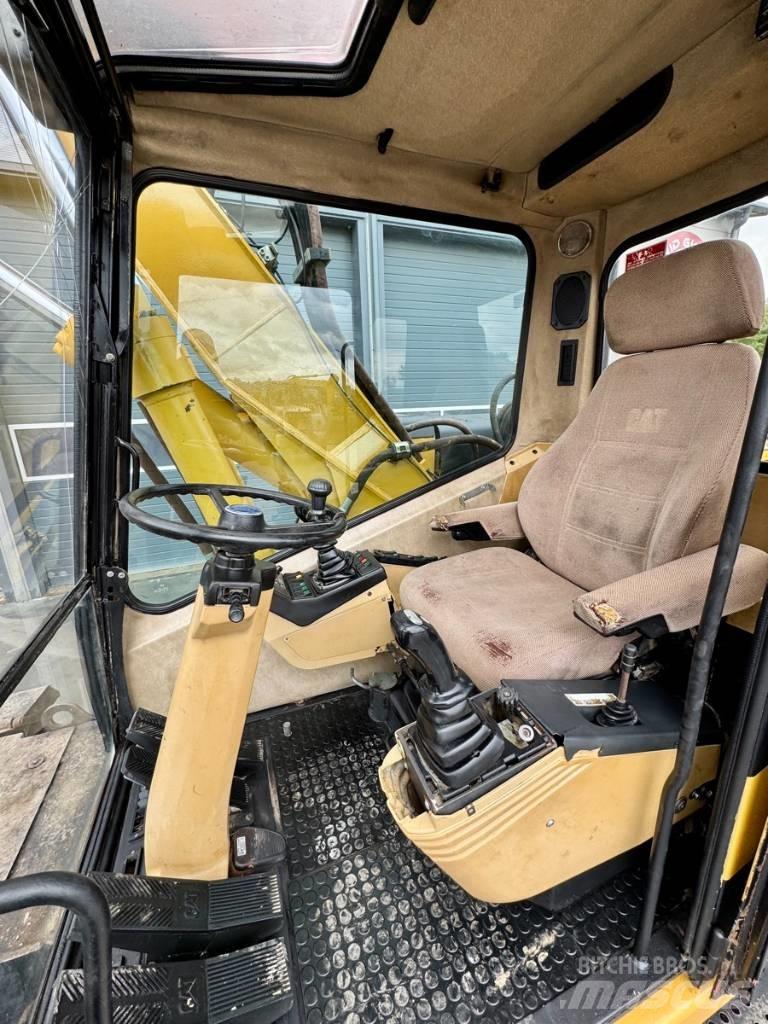 CAT M 315 Gumikerekes kotrók