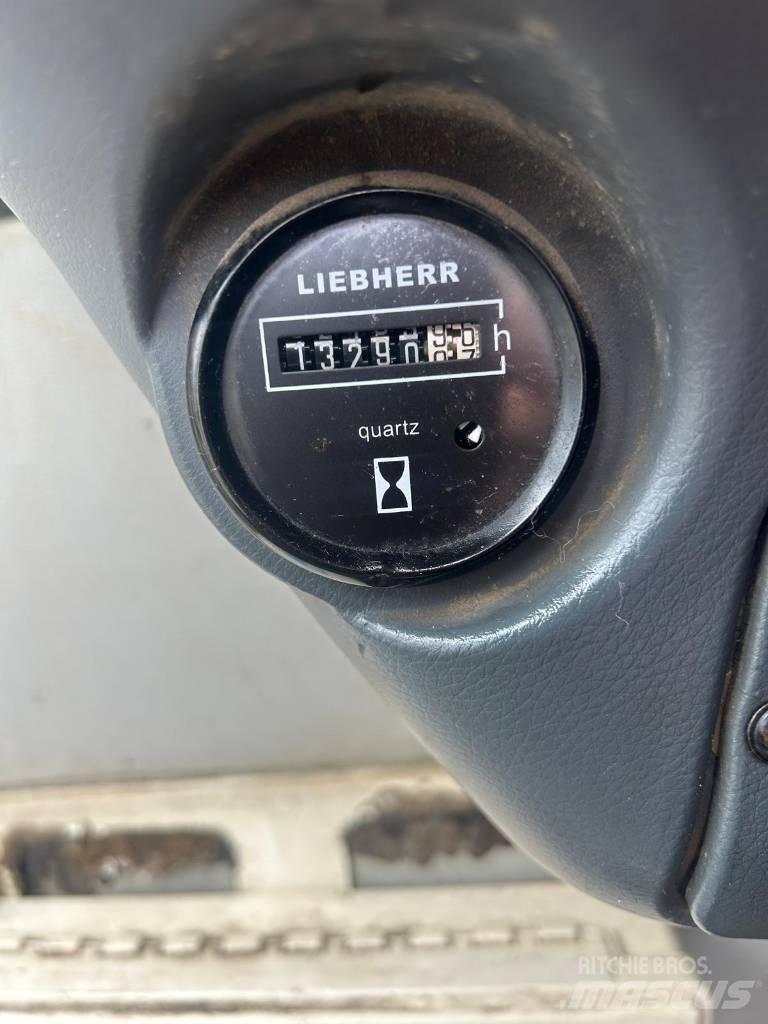 Liebherr 314 Gumikerekes kotrók
