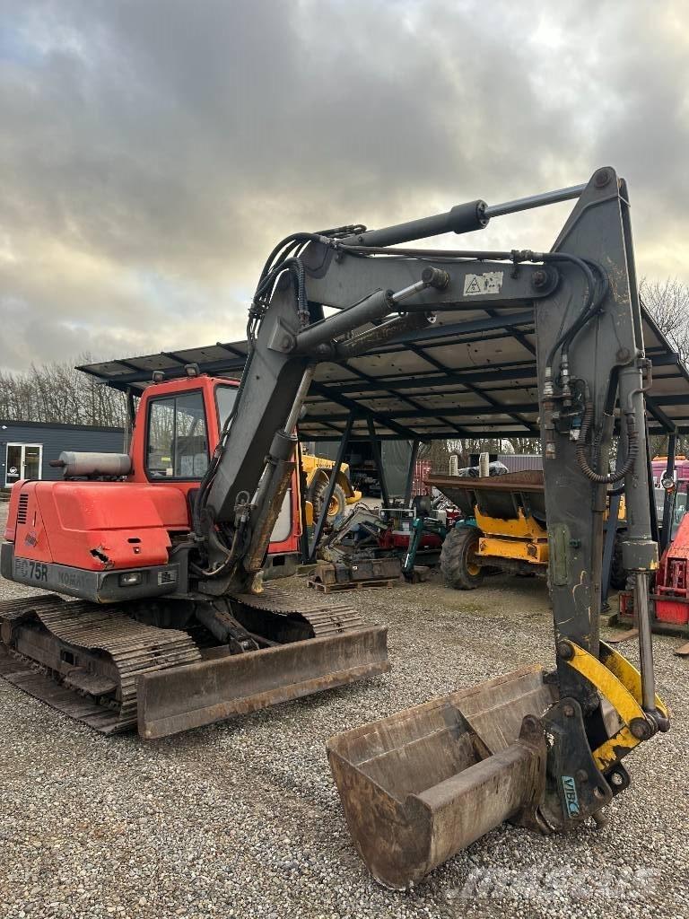 Komatsu PC 75 Közepes (midi) kotrók 7 t - 12 t