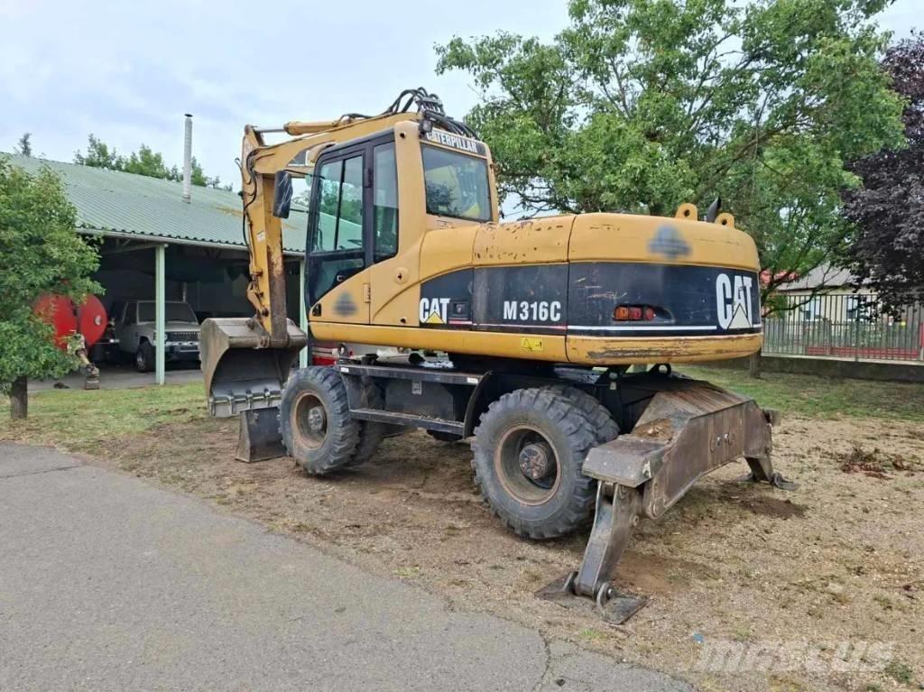 CAT M 316 C Gumikerekes kotrók