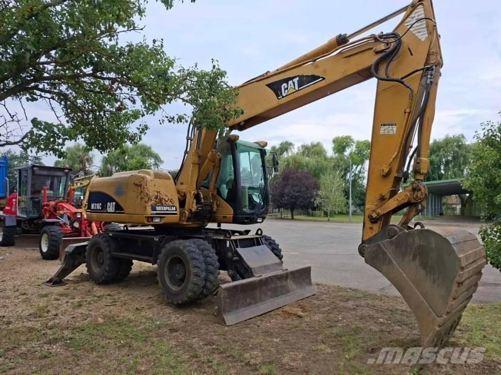 CAT M 316 C Gumikerekes kotrók