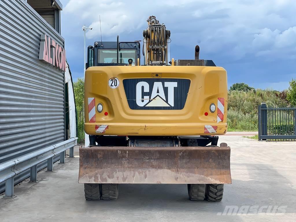 CAT M318F Gumikerekes kotrók