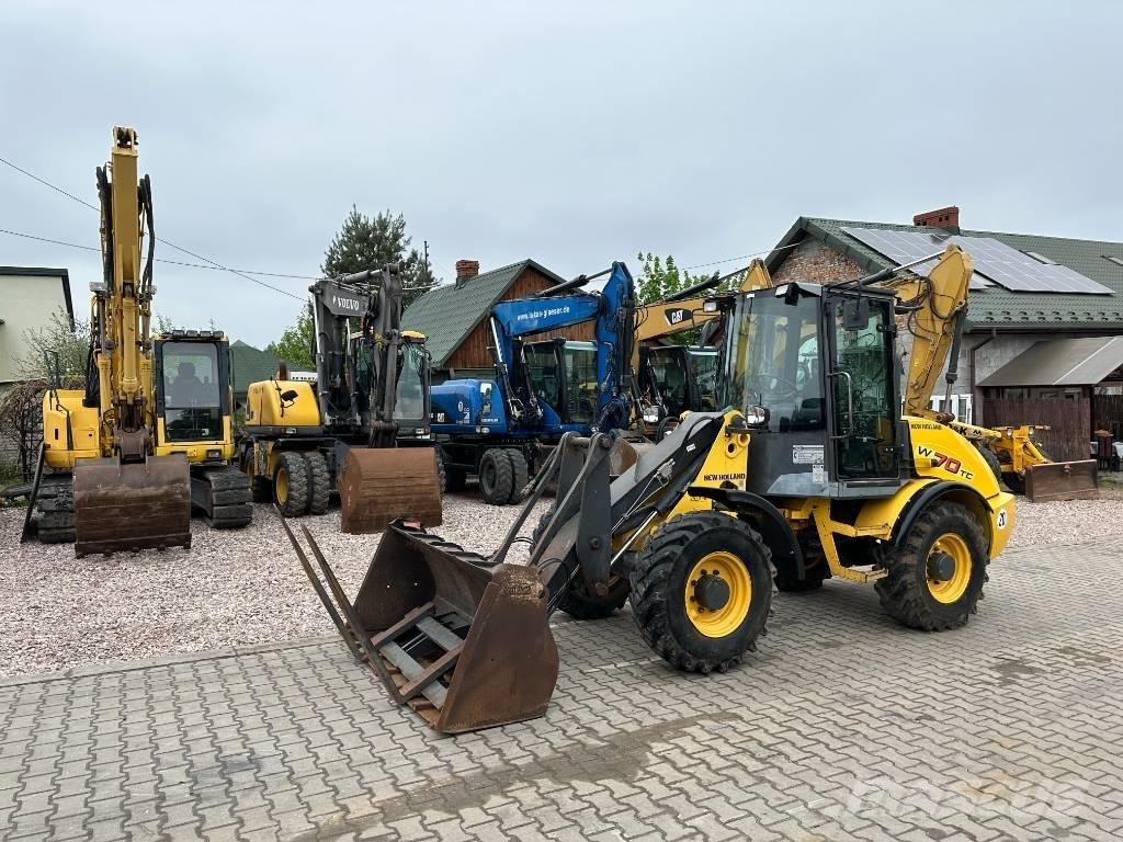New Holland W 70 TC Gumikerekes homlokrakodók