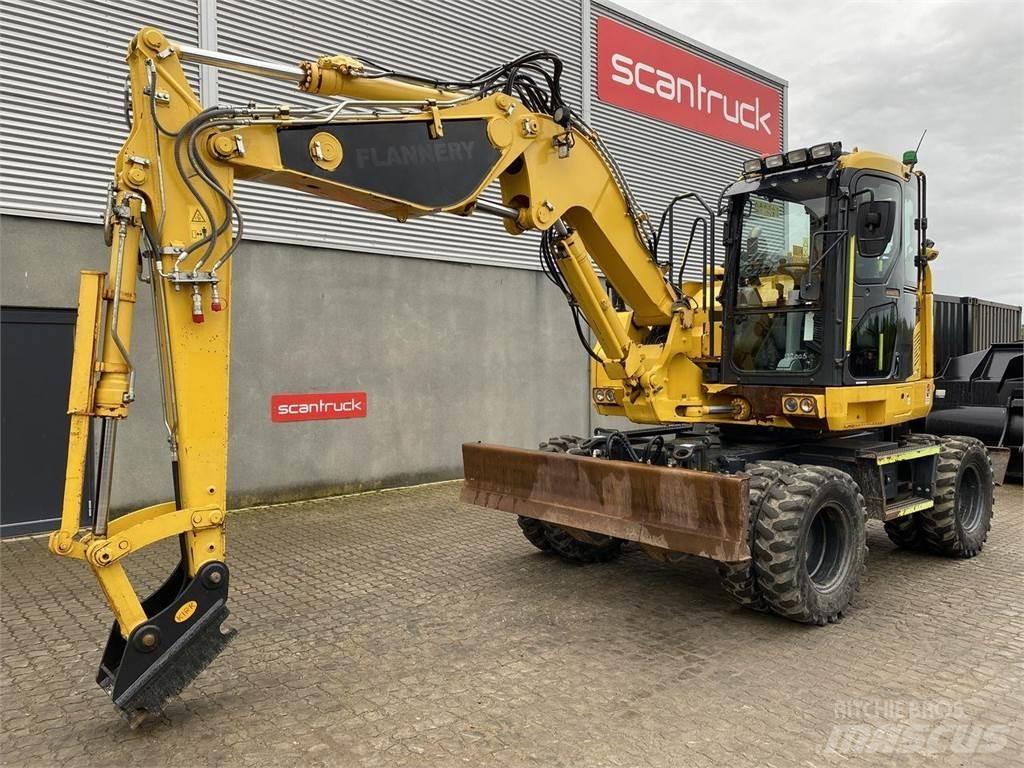Komatsu PW118MR-11 Gumikerekes kotrók