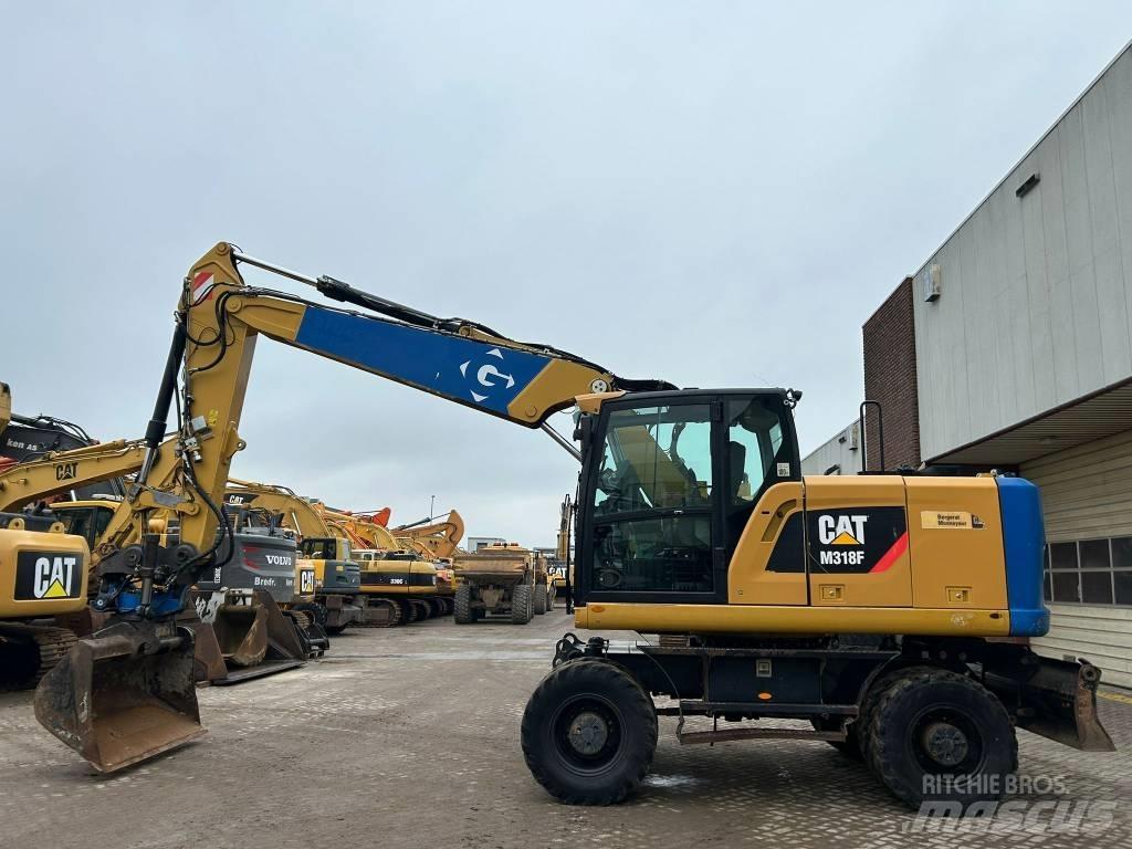 CAT M 318 F Gumikerekes kotrók