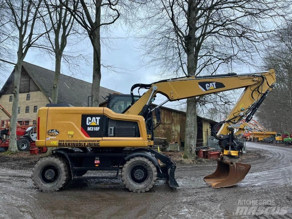 CAT M 318 F Gumikerekes kotrók